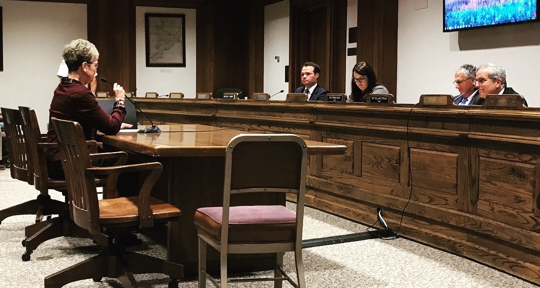 Sen. Eric Lesser (D-MA) answering questions from individuals.